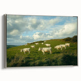 Framed landscape canvas artwork showcasing a serene countryside scene with lush greenery and rolling hills, set in an elegant silver frame, ideal for home decor.