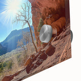 Close-up of a vibrant acrylic glass artwork depicting a stunning desert landscape, showcasing warm hues of orange and yellow, perfect for modern home decor.