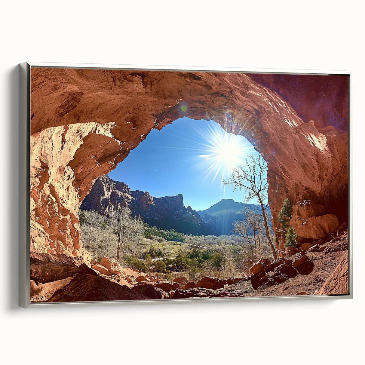 Framed canvas artwork depicting a stunning desert landscape, showcasing vibrant colors and intricate details, presented with a sleek silver frame for an elegant touch.