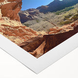 Desert landscape rolled canvas print showcasing warm tones of orange and brown, depicting expansive sand dunes under a vibrant sunset, ideal for home decor.