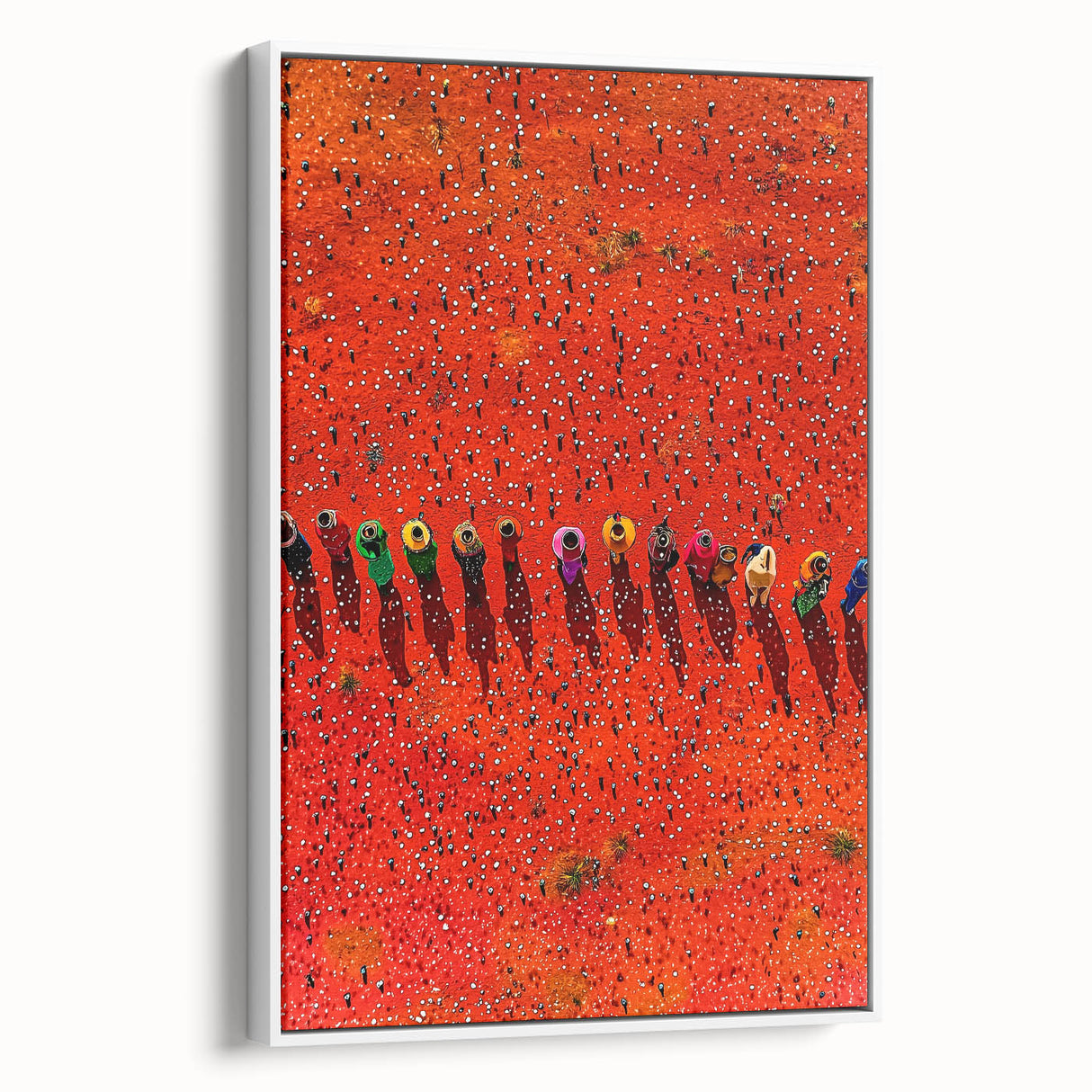Framed canvas artwork depicting a serene landscape with vibrant fields, showcasing rich greens and yellows, set against a white frame for modern decor.