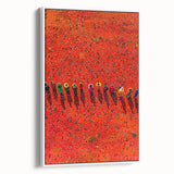 Framed canvas artwork depicting a serene landscape with vibrant fields, showcasing rich greens and yellows, set against a white frame for modern decor.