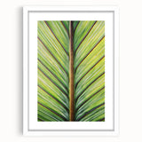Abstract art print featuring close-up floral designs in soft pastel shades on a white framed canvas.