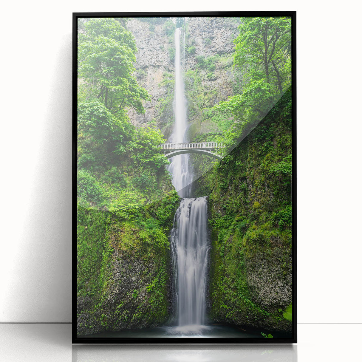 Large abstract wall art featuring swirling blue and green patterns on a framed acrylic, ideal for modern living room decor.