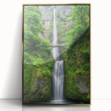 Large art print of a spring landscape in pastel shades on acrylic, framed in gold, in a mid-century modernist style.