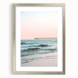 Textured abstract art print with swirls in silver and gray hues, framed in silver, ideal for bedroom ambiance.