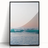 Large abstract wall art featuring swirling blue and gold patterns on a black acrylic print.