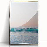 Mid-century modernist art depicting abstract shapes in pastel shades on a silver framed acrylic print.