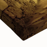 Close-up of a stretched canvas artwork depicting a vibrant landscape with a medieval castle, showcasing rich colors and fine details, perfect for home decor.