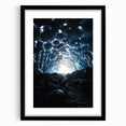 Framed landscape artwork showcasing a serene cave scene in a black mat and frame, ideal for home decor and art enthusiasts seeking natural beauty.