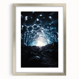 Framed landscape artwork depicting a serene cave scene, featuring a silver matting and a polished frame, ideal for enhancing home decor with nature-inspired aesthetics.