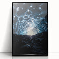 Framed acrylic wall art showcasing a stunning landscape with intricate cave formations, featuring a sleek black frame, perfect for modern home décor.