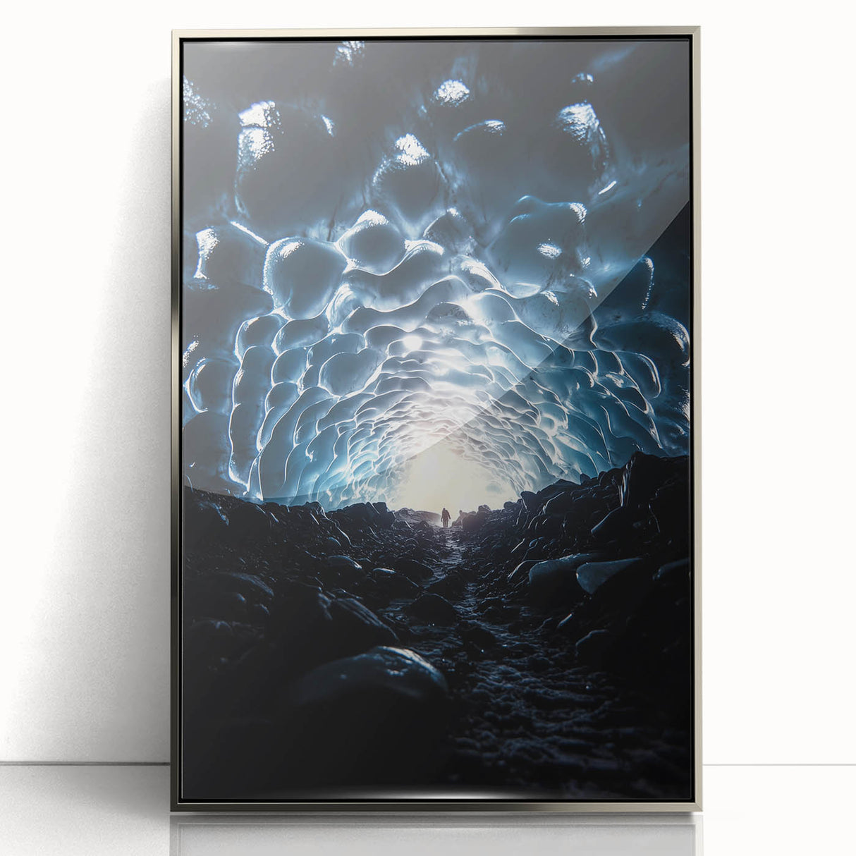 Framed acrylic artwork showcasing a stunning landscape of caves, featuring a sleek silver border. Perfect for adding a modern touch to home decor.