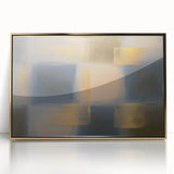 Framed acrylic wall art featuring an abstract geometric design in gold tones, set against a sleek background. Perfect for modern home decor accents.