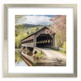 Textured art print of an abstract covered bridge in muted gray tones, framed with a silver mat, suitable for bedroom decor.