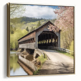 Framed canvas wall art featuring a vintage-style landscape of a covered bridge in silver and gold tones.