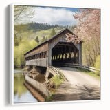 Framed canvas featuring a vintage poster art of a covered bridge in muted black and white, ideal for living room decor.