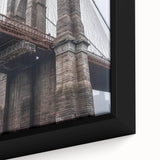 Close-up of a framed landscape artwork depicting a serene bridge scene, showcasing vibrant colors and intricate details, ideal for home decor enthusiasts.