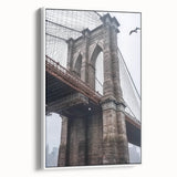 Framed canvas artwork depicting a serene landscape with a bridge, showcasing vibrant colors and intricate details. Perfect for home decor or art enthusiasts.