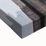 Close-up of a stretched canvas artwork depicting a stunning landscape bridge scene, showcasing vibrant colors and intricate details, perfect for home decor.