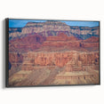 Framed landscape canvas art depicting vibrant canyons with rich colors and textures, featuring a sleek black frame that enhances its depth and elegance. Perfect for home decor, this artwork adds a touch of nature-inspired beauty to any room.