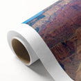 Landscape canvas print showcasing vibrant canyons in warm earth tones, designed for wall decor. Rolled and packaged securely in a protective tube for easy display.