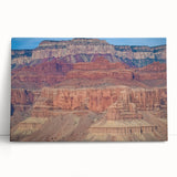 Stretched canvas artwork depicting a vibrant landscape of canyons with rich colors, perfect for home decor. Ideal for nature lovers seeking stunning wall art.
