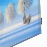 Vibrant close-up of a countryside landscape painting on acrylic glass, showcasing lush green fields and a serene blue sky, perfect for home decor.