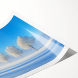 Rolled print showcasing a vibrant countryside landscape with rolling hills and a clear blue sky, elegantly packaged in a protective cardboard tube for optimal display.