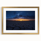 Golden-framed desert landscape artwork with a mat, showcasing vibrant colors and intricate details, perfect for home decor or gallery display.