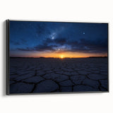 Framed canvas artwork depicting a serene desert landscape, featuring warm earthy tones and intricate details, presented in a sleek black frame for modern decor.