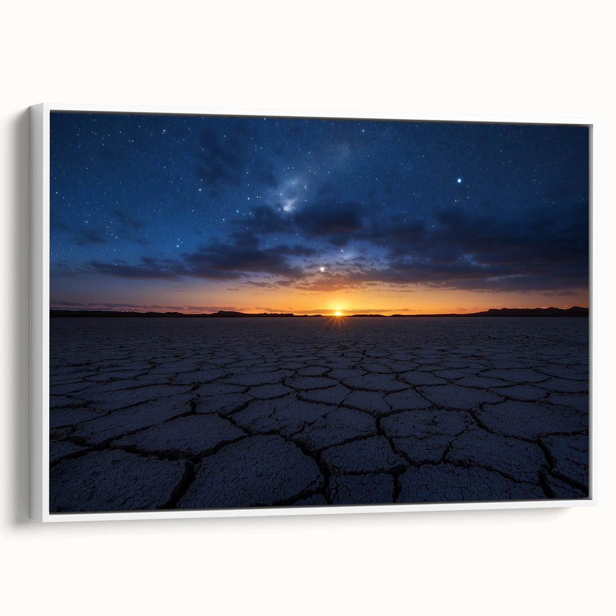 Framed canvas artwork depicting a desert landscape with warm colors and intricate details, showcasing a serene desert scene with cacti and mountains in a stylish white frame. Perfect for home decor in living rooms or offices.