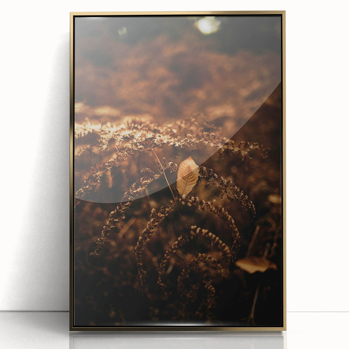 Large art print of a mid-century modernist autumn scene in muted gold and orange tones, framed acrylic.
