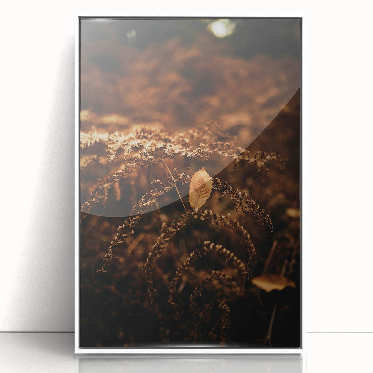 Art deco poster of autumn trees in vibrant orange and red hues, framed in white acrylic, ideal for nursery wall decor.