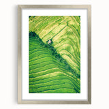 Textured abstract art print in pastel shades, framed in silver, ideal for bedroom decor.