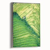 Framed canvas of a vintage-style landscape painting with colorful spring scenery, ideal for enhancing a living room decor.