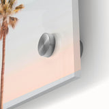 Large abstract wall art in vibrant orange and blue tones on acrylic glass.