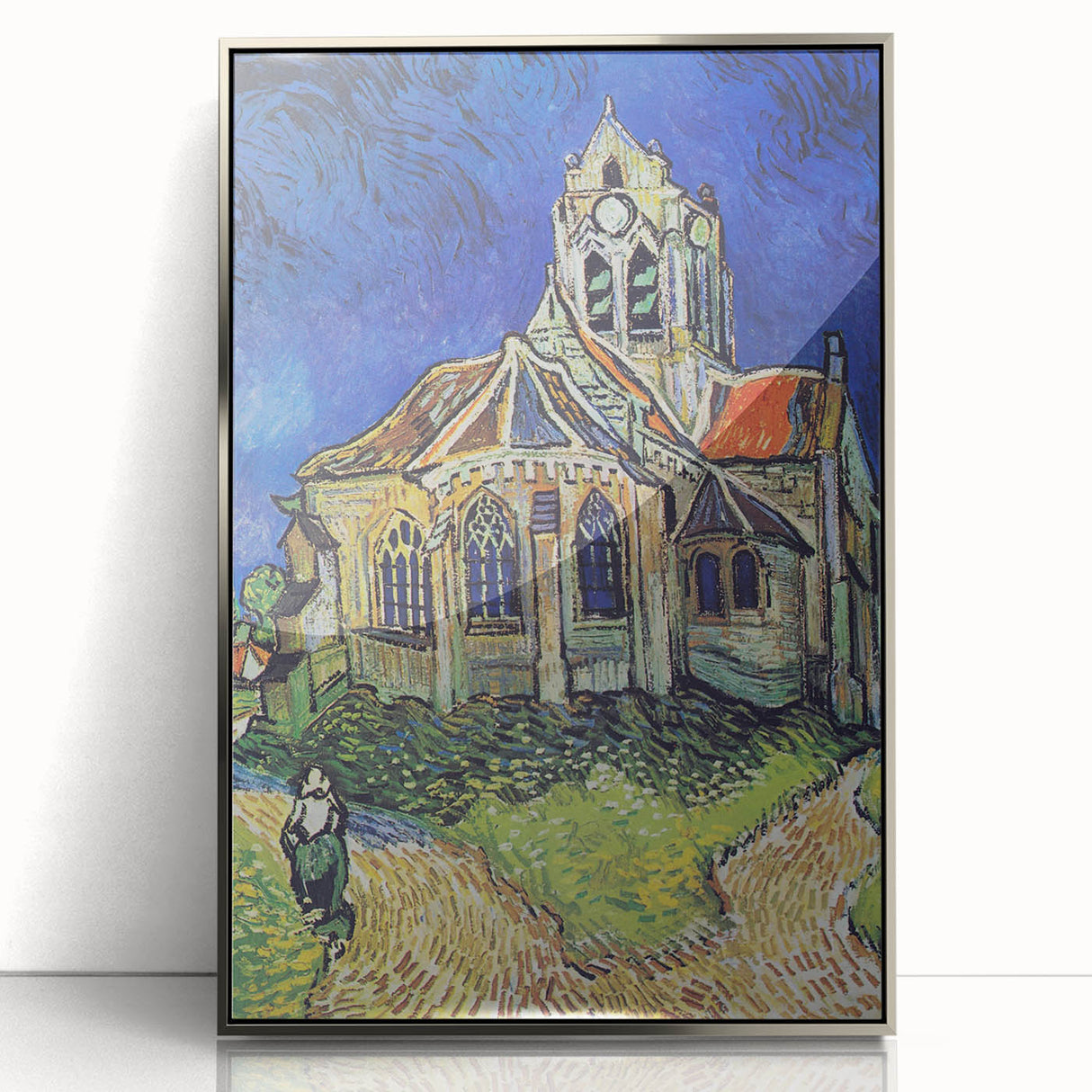 Large art print of Van Gogh's painting in silver frame, featuring vibrant blue and yellow tones.