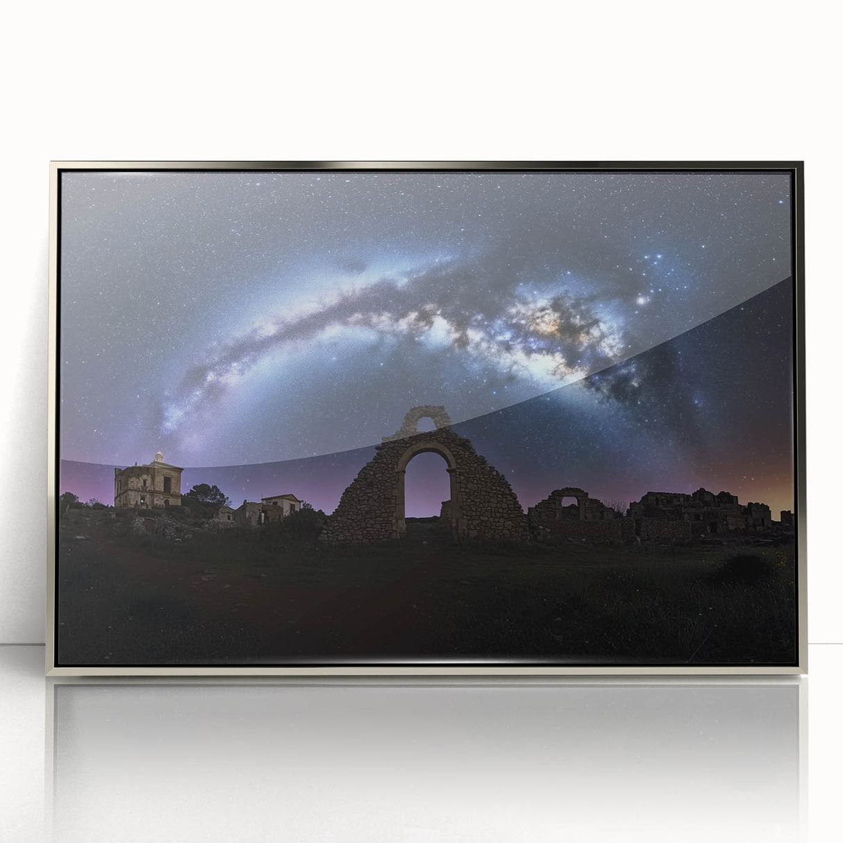 Framed acrylic artwork depicting a serene landscape with a majestic castle, presented in a sleek silver frame. Ideal for home decor or art collectors.