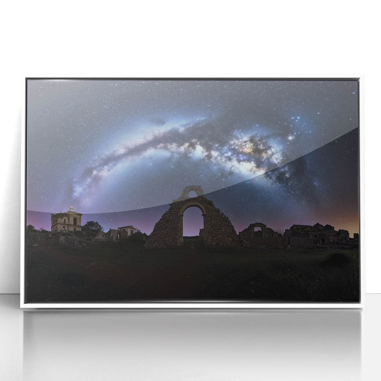 Framed acrylic landscape artwork depicting a majestic castle surrounded by lush greenery, presented in a sleek white frame, perfect for home decor.
