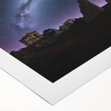 Rolled canvas showcasing a serene landscape with a majestic castle, featuring vibrant colors and intricate details, ideal for home decor or art enthusiasts.