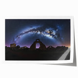 Rolled print showcasing a vibrant landscape scene with a majestic castle surrounded by lush greenery and blue skies, ideal for home decor or art enthusiasts.