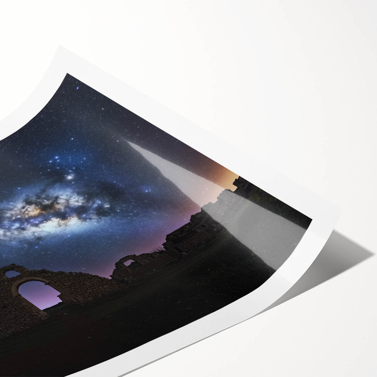 Rolled print showcasing a vibrant landscape with a majestic castle, featuring lush greenery and a clear blue sky, elegantly packaged in a protective tube for safekeeping.