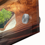 Close-up of a vibrant acrylic glass artwork depicting colorful landscapes and caves, showcasing intricate textures and details, ideal for modern home decor.