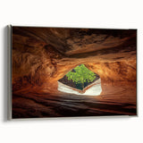Framed canvas artwork depicting a stunning landscape with intricate cave formations, featuring a sleek silver frame, ideal for modern home decor.