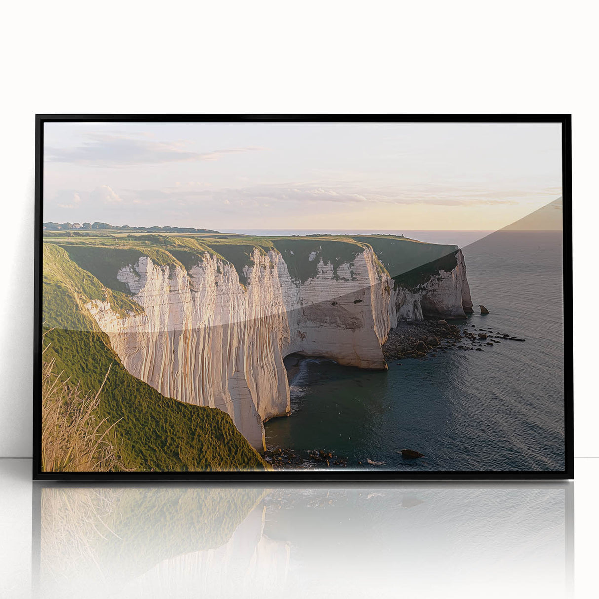 Framed acrylic artwork showcasing a dramatic cliff landscape with vibrant colors, displayed in a sleek black frame, ideal for modern home decor.