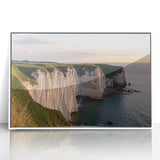 Framed acrylic artwork showcasing a stunning landscape with dramatic cliffs and vibrant colors, set against a white border for a modern aesthetic. Ideal for enhancing home decor.