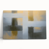Abstract geometric canvas art featuring bold colors and sharp lines, leaning against a textured wall, perfect for modern home decor and artistic statements.