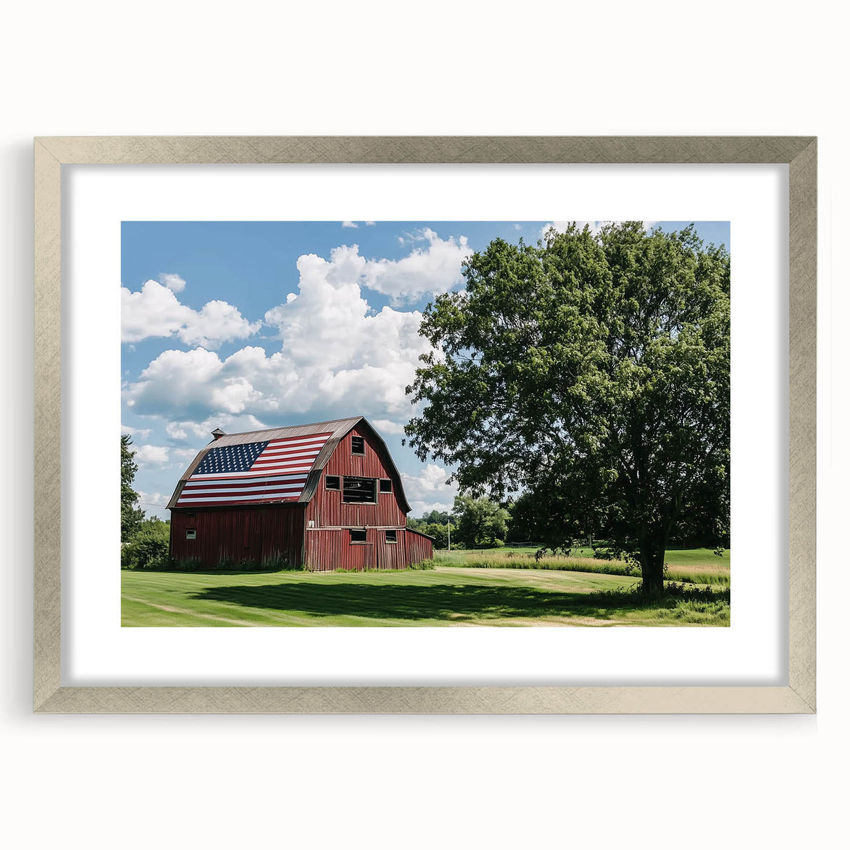 Silver-framed landscape barn print with a mat, showcasing rustic charm and detailed artwork, ideal for home decor or gallery displays.