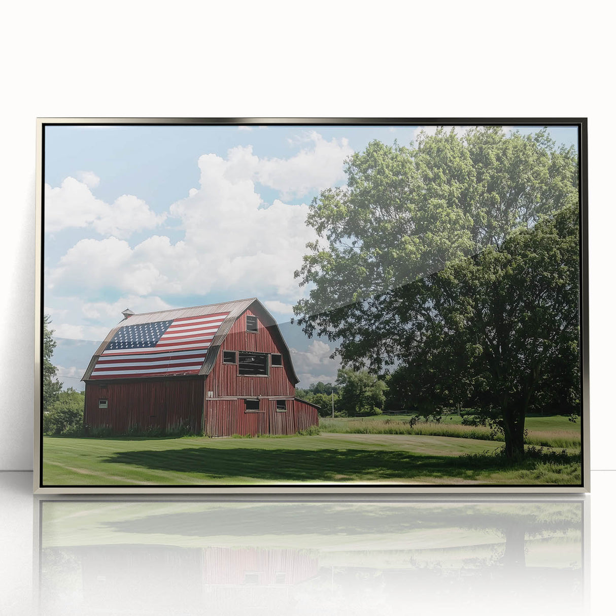 Framed acrylic wall art showcasing a serene landscape scene with a barn, highlighted by silver accents. Perfect for home decor, this artwork adds rustic charm to any space.